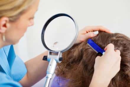 Head lice Treatment using a Comb.