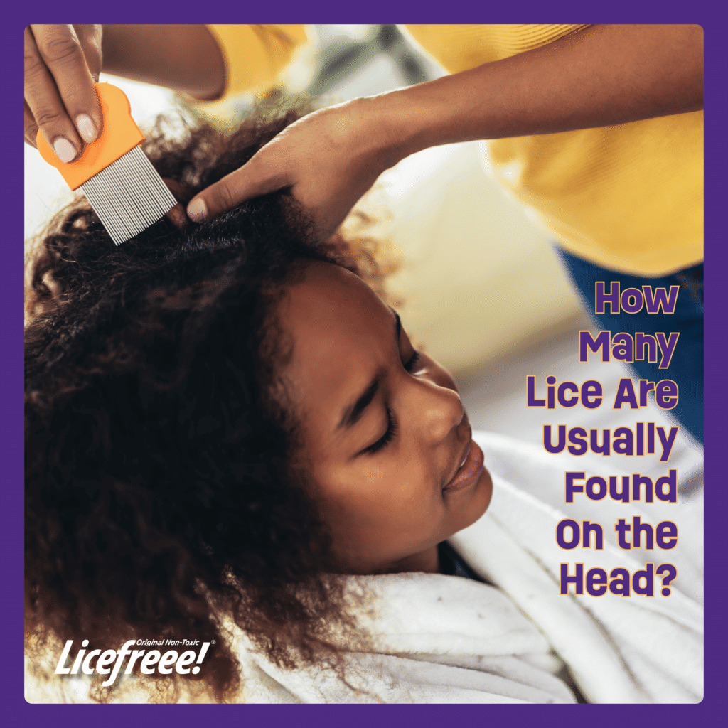 A young girl's hair is being checked by her mom for lice using a nit comb.